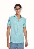 ADEL & VIDA Mint Horizon slim fit blue striped shirt with cuban collar and half sleeves worn by a male model.