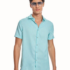 ADEL & VIDA Mint Horizon slim fit blue striped shirt with cuban collar and half sleeves worn by a male model.