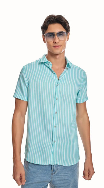 ADEL & VIDA Mint Horizon slim fit blue striped shirt with cuban collar and half sleeves worn by a male model.