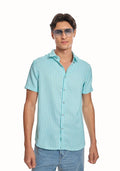 ADEL & VIDA Mint Horizon slim fit blue striped shirt with cuban collar and half sleeves worn by a male model.