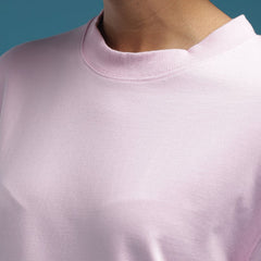ADEL & VIDA baby pink oversized crewneck sweatshirt with soft breathable fabric for everyday wear