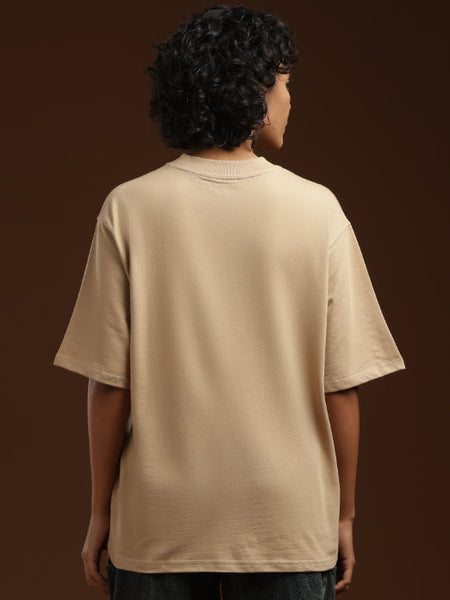 ADEL & VIDA beige oversized t-shirt worn by a model, back view showing soft breathable fabric and minimalist style