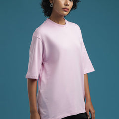 ADEL & VIDA oversized baby pink t-shirt for women in soft breathable fabric worn by a model